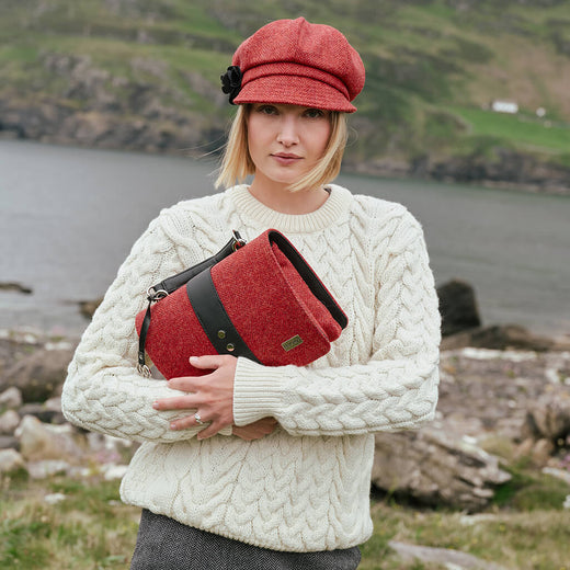 Women's Classic Irish Wool Newsboy Cap in red, crafted from authentic Irish tweed with a classic newsboy silhouette and decorative floral detail, paired with the matching Fiona Tweed Bag