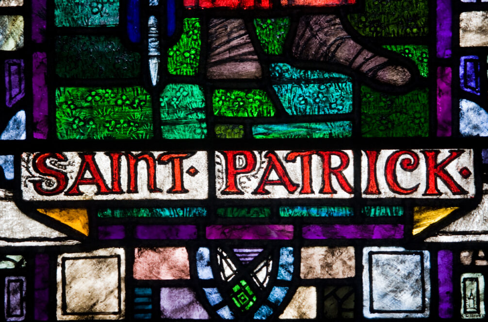 Stained glass panel featuring the words