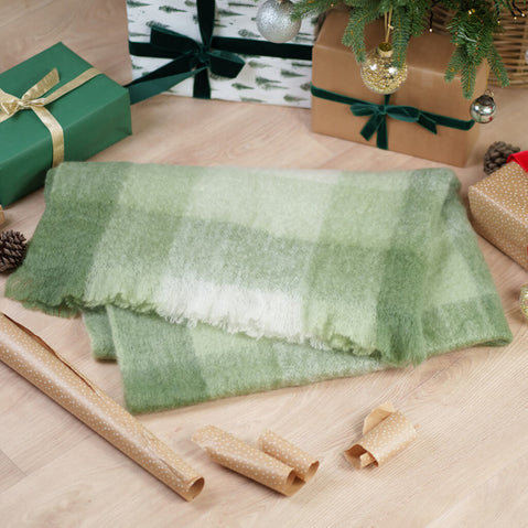 Foxford Mohair Throw in festive Christmas colors - luxurious Irish wool blanket with traditional pattern, perfect for cozy holiday warmth