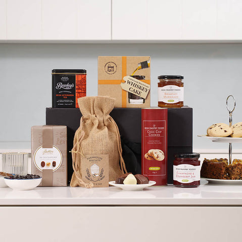 Thinking of you Irish gift basket with tea, biscuits, whiskey cake, chocolates and preserves