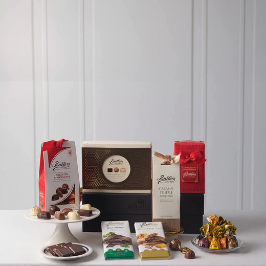 Butlers chocolate products including boxes, bags, and truffles on a white surface with a light gray background.
