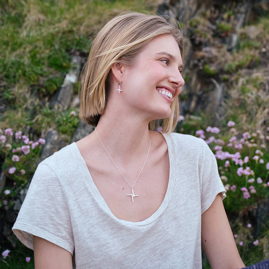 Image featuring the St. Brigid’s Cross Silver Earrings and Pendant Set, crafted in sterling silver with the iconic St. Brigid’s Cross design, showcasing a matching pendant necklace and drop earrings inspired by Irish heritage and tradition.