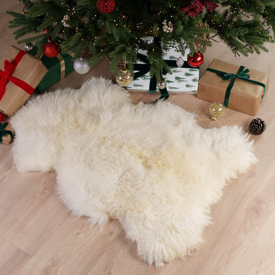 Luxurious sheepskin throw with festive Christmas decorations
