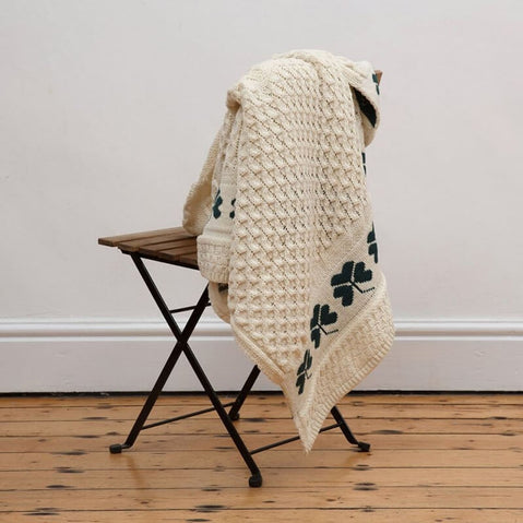 Irish Home Decor - Wool Shamrock Throw Blanket hanging on a chair