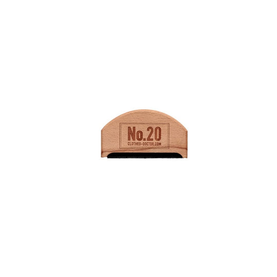 A wooden comb with the text 'No.20' and 'IRISH CRAFT' inscribed on it.