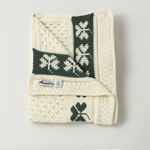 Cream wool shamrock throw blanket folded shot 