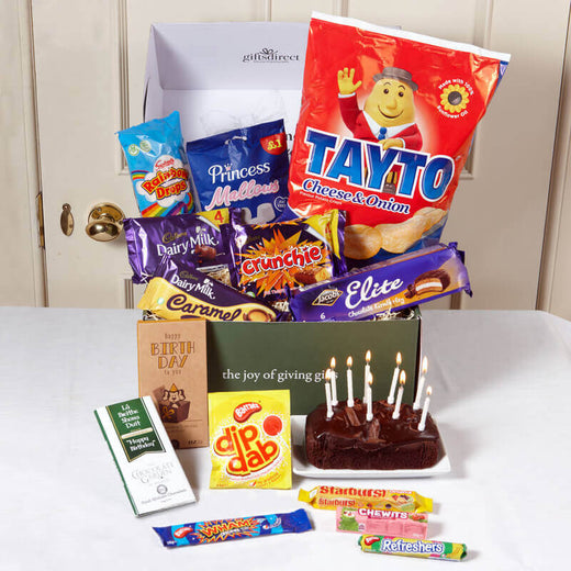 Irish birthday gift box with Tayto crisps, chocolate bars, sweets and birthday cake with candles