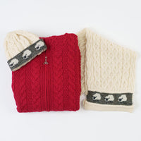 Women's Hooded Aran Zipper Classic Coat in red with Celtic trinity knot zipper paired with Women's Aran Sheep Hat & Scarf Set in cream with sheep pattern trim