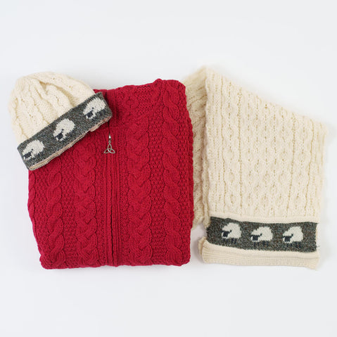 Women's Hooded Aran Zipper Classic Coat in red with Celtic trinity knot zipper paired with Women's Aran Sheep Hat & Scarf Set in cream with sheep pattern trim
