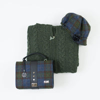 Women's Classic Irish Wool Newsboy Cap in tartan plaid and Fiona Tweed Bag with Celtic design, styled with Women's Hooded Aran Zipper Classic Coat in green
