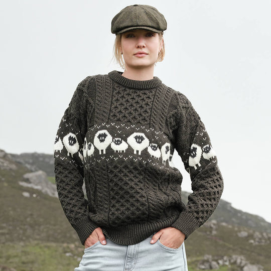 Image featuring the Traditional Sheep Aran Sweater in brown, crafted with authentic Irish Aran knit patterns and iconic sheep motifs, combining heritage-inspired Irish knitwear with timeless countryside style and traditional craftsmanship.