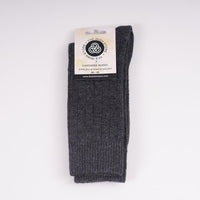 A set of men's cashmere blend socks in beige, brown, and black colors, displayed with a 'Cashmere' brand tag.