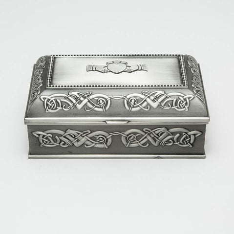 A large rectangular Mullingar Pewter jewelry box with Celtic knot designs and a claddagh ring motif on the lid.