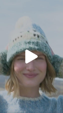 Video from The Irish Store showcasing the Women’s Mohair Sheep Bobble Beanie worn outdoors under an Irish sky.