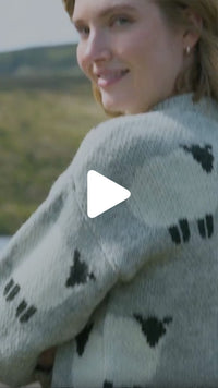 Video from The Irish Store featuring the Women’s Sheep Aran Sweater, focusing on the textured Irish wool knit outdoors in Ireland.