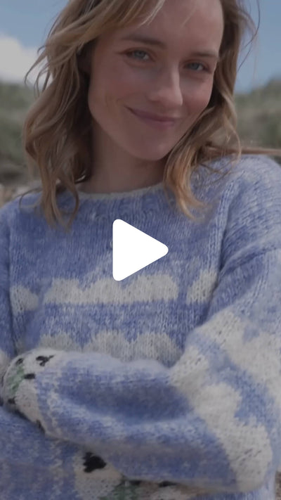 Video from The Irish Store showing the Women’s Mohair Sheep Sweater worn outdoors in the Irish countryside.
