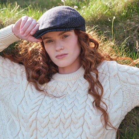 Image featuring the Women's Cable Knit Crew Neck Sweater in natural, crafted with authentic Irish cable knit patterns and a timeless crew neck silhouette, inspired by Ireland's rich knitting heritage and traditional craftsmanship.